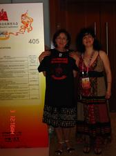 Prof. Ene Kangron, after presentation @ the Int'l Symposium, Beijing, 2010, showing her support for the message of Advocacy for Music Education from C.H.A.R.I.S.M.A. Foundation