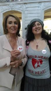 Hon.Nancy Pelosi, Speaker of US House of Representatives  shows enthusiastic support to Rozalina Gutman, holding the pin with the logo for initiated by her cause for under-publicized crisis around Women�s Heart Disease