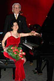 Ms. Gutman by Fazioli Grand Piano after premiere of her new composition at the Conference&#39;2005 of the Pacific Voice and Speech Foundation at Pixar, with the Founder  Krzysztof Izdebski, Assoc. Professor of Stanford University