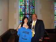Rozalina Gutman with Donald Guest, Pastor of Glide Memorial Church, showing support for the message of Advocacy for Music Education from C.H.A.R.I.S.M.A. Foundation