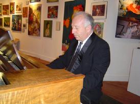 Edward Zon, pianist, performing at the New Year's Arts and Music Salon, benefit for CHARISMA Foundation, produced by !Class Act Productions