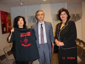 Ms. Rozalina Gutman presented  the advocacy message t-shirt, at the time of meeting with Mr. Joannis Andreades, Consul General of Greece and his wife, at the musical event, dedicated to the Holocaust in Saloniki, Foster City, JCC, 11.13.2010, discussing her upcoming project of Int'l Campaign for Music Education through Brain/Music Research at the upcoming 30th World Conference of ISME'2012, Thessaloniki, Greece, while enjoying very supportive remarks from them and the staff of the SF Greek Consulate.