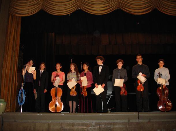 Ms. R. Gutman, the Chair for YAA, presenting Awards to the Winners of Young Artist Award Competition 2005, at the Etude Cloub of Berkeley, CA, USA.  To see the names of all the winners, please, click on the button "More About Etude Club"